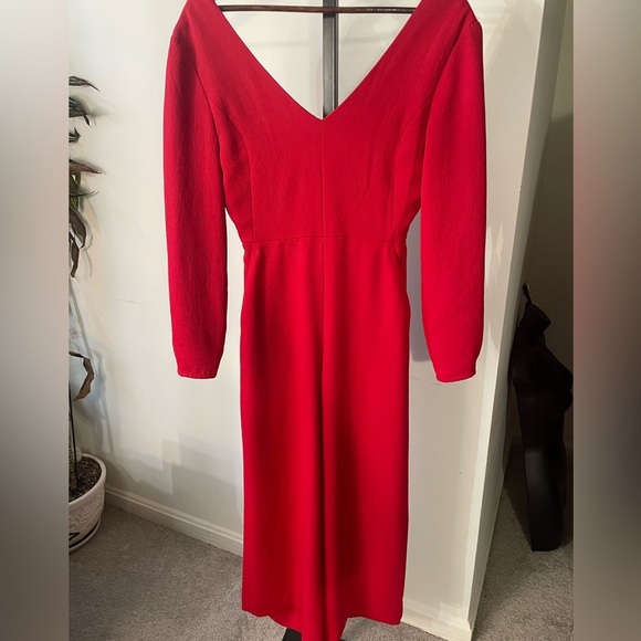 Aritzia || Wilfred Red Jumpsuit, with open back detailing
Size 4,Wedding Attire - Picture 1 of 7